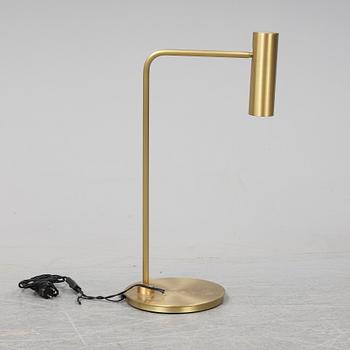 A 'Heron' brass table light by Michael Verheyden for CTO lighting.