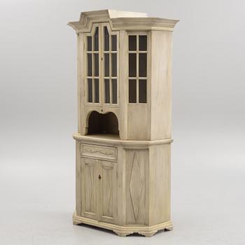 Display cabinet, circa 1900.