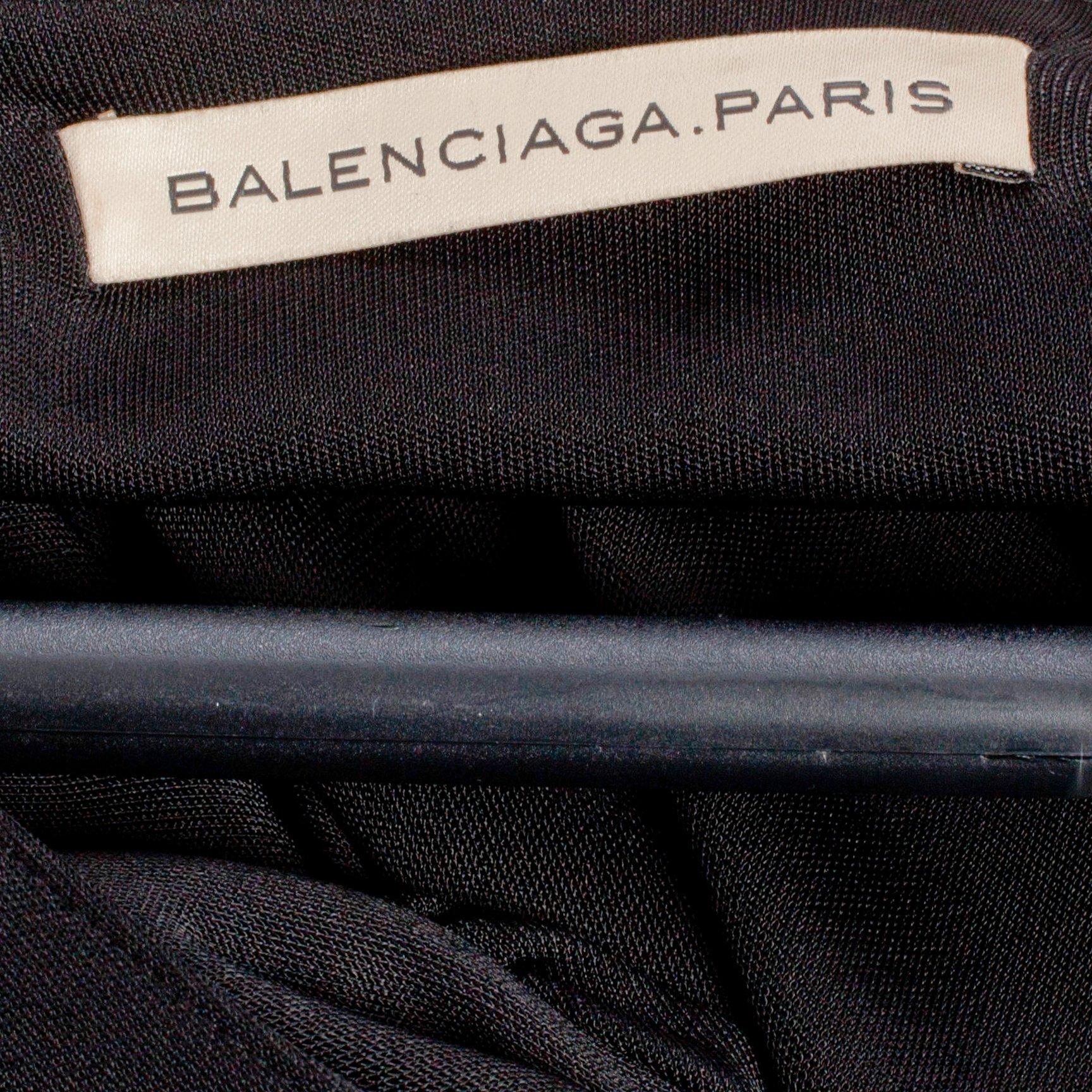 BALENCIAGA, a black dress.