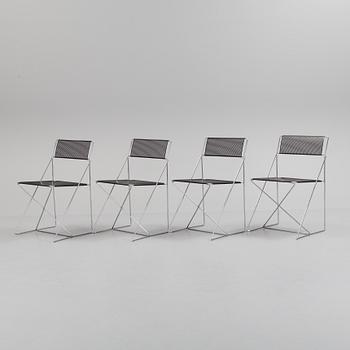 A set of four "X-line" chairs by Niels Jörgen Haugesen.