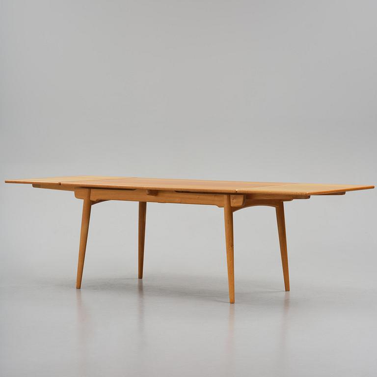 Hans J. Wegner, an "AT-312" dining table, Andreas Tuck, Denmark, 1950s-60s.