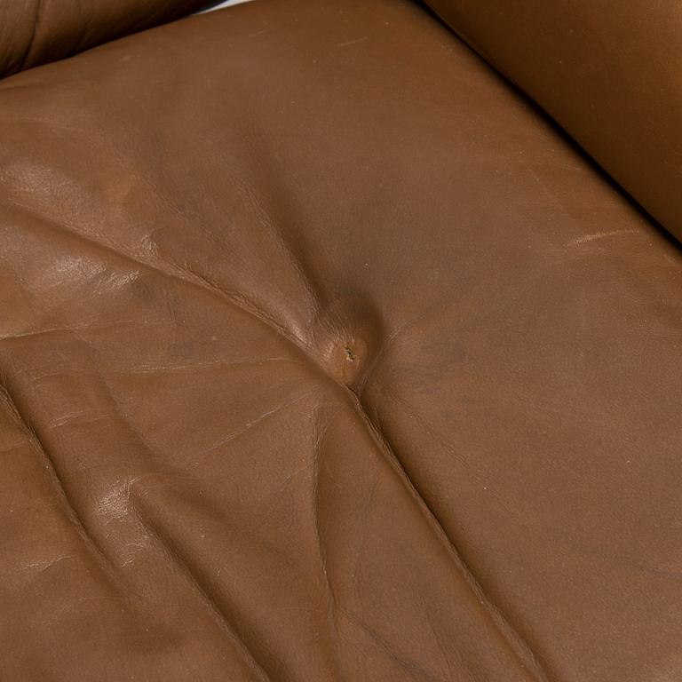 Charles and Ray Eames, a 1980s 'Lounge chair' and stool for Herman Miller.