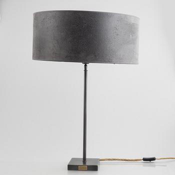 A pair of "Pewter" table lamps with different lampshades from Artwood.