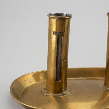 A pair of North European Brass double candelholders, 19th century.