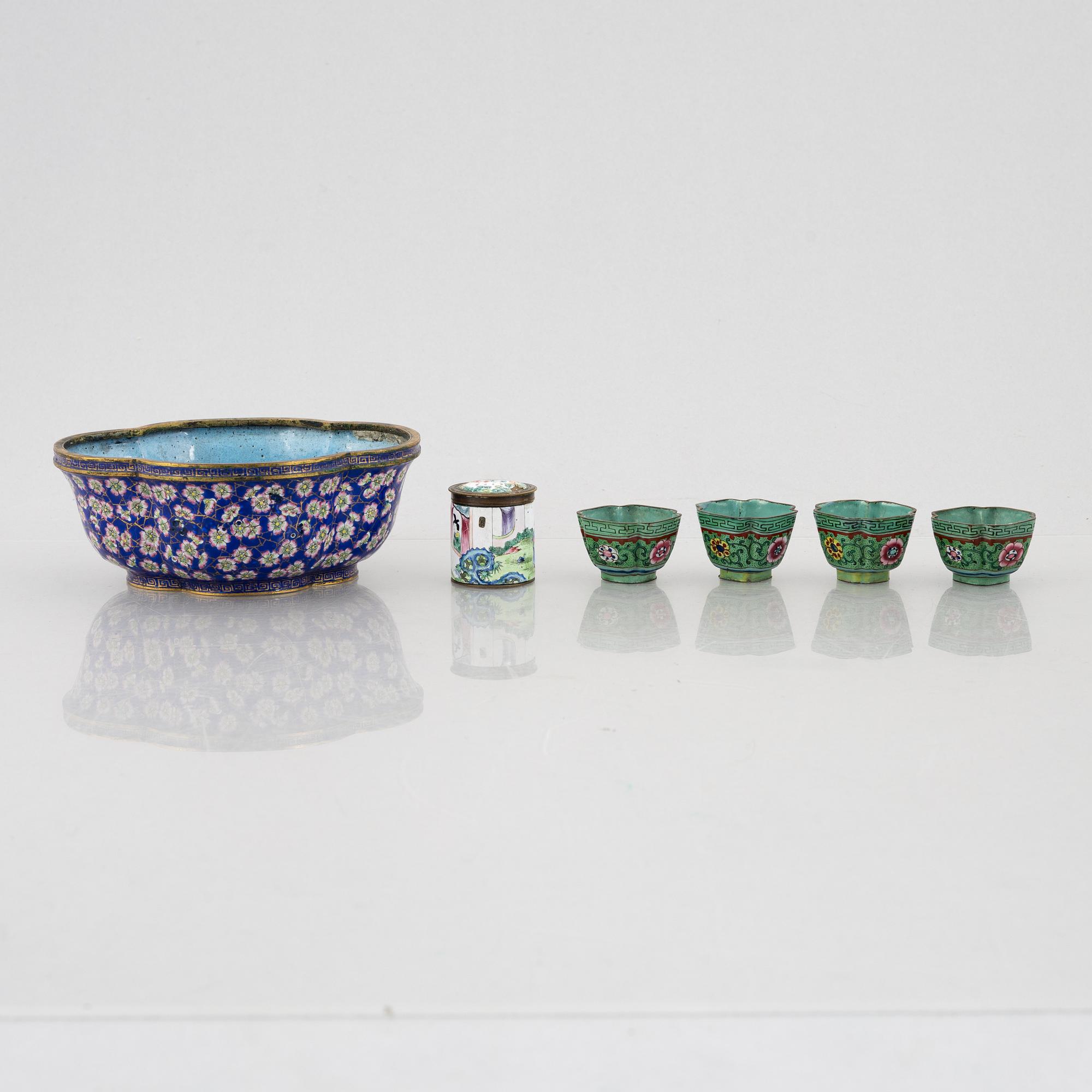 A group of Chinese enamels, including a flower pot, a box and four cups, Qing dynasty, 18th and 19th century.