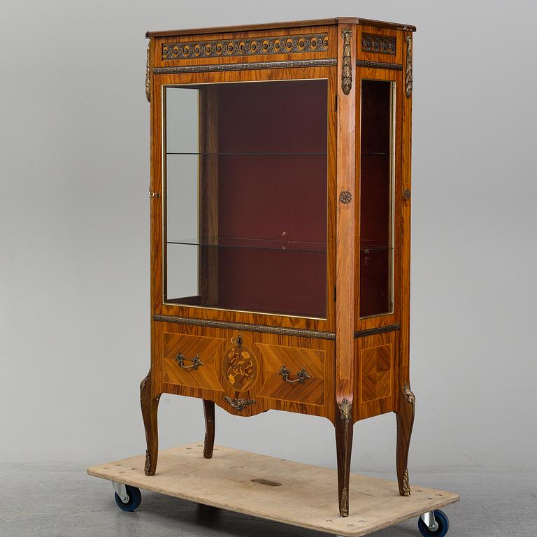 A Louis-XVI style display cabinet, third quarter of 20th century.