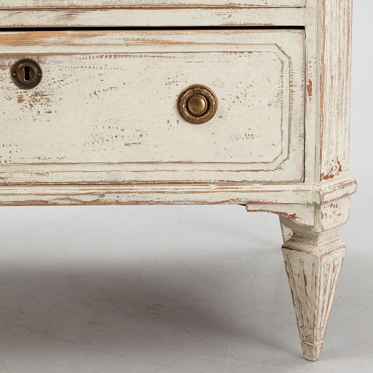 A Gustavian style chest of drawers, early 20th century.