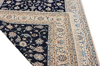 A part silk Nain rug, 9LA, c. 302 x 198 cm.