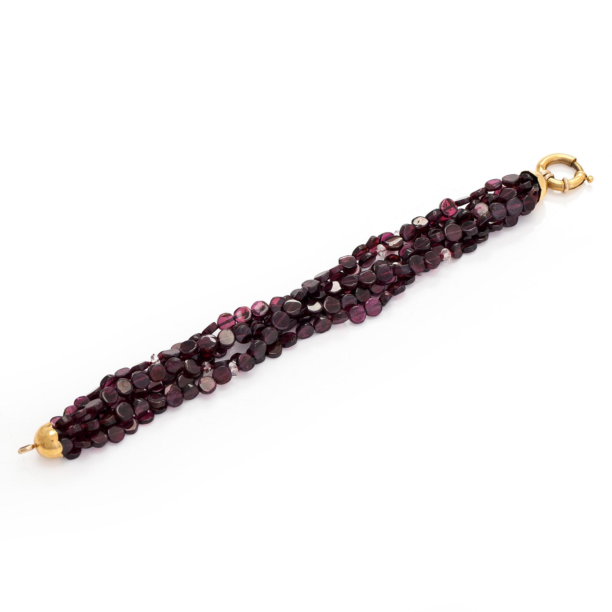 Rannekoru, 18K kultaa ja granaatteja.