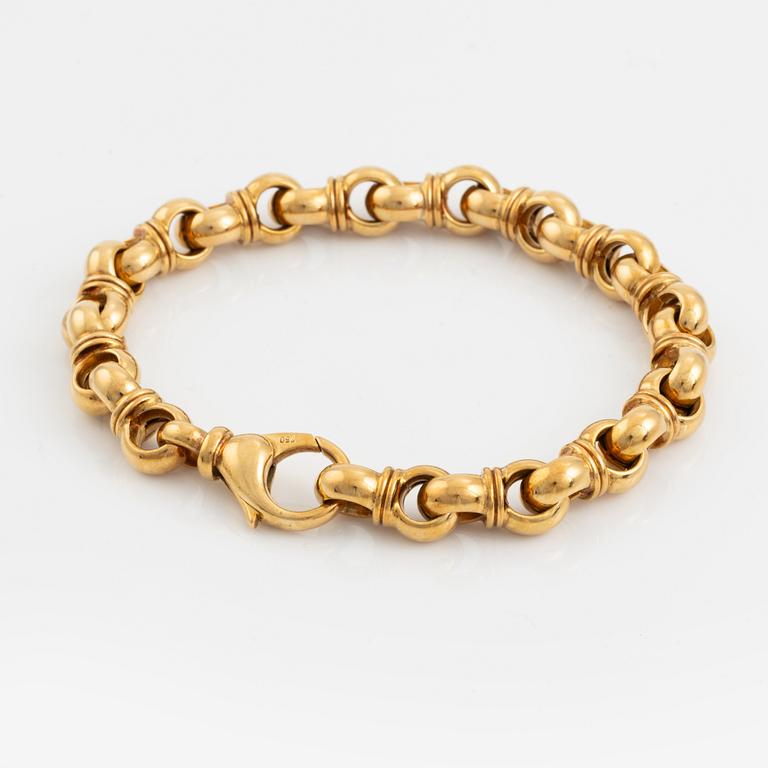 An 18K gold Tännler bracelet.
