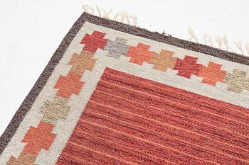 A flat weave 'Kastellholm' carpet by Ingegerd Silow, c 240 x 154 cm, signed IS.