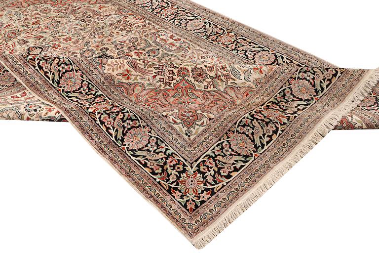 A carpet, silk Kashmir, c. 279 x 180 cm.