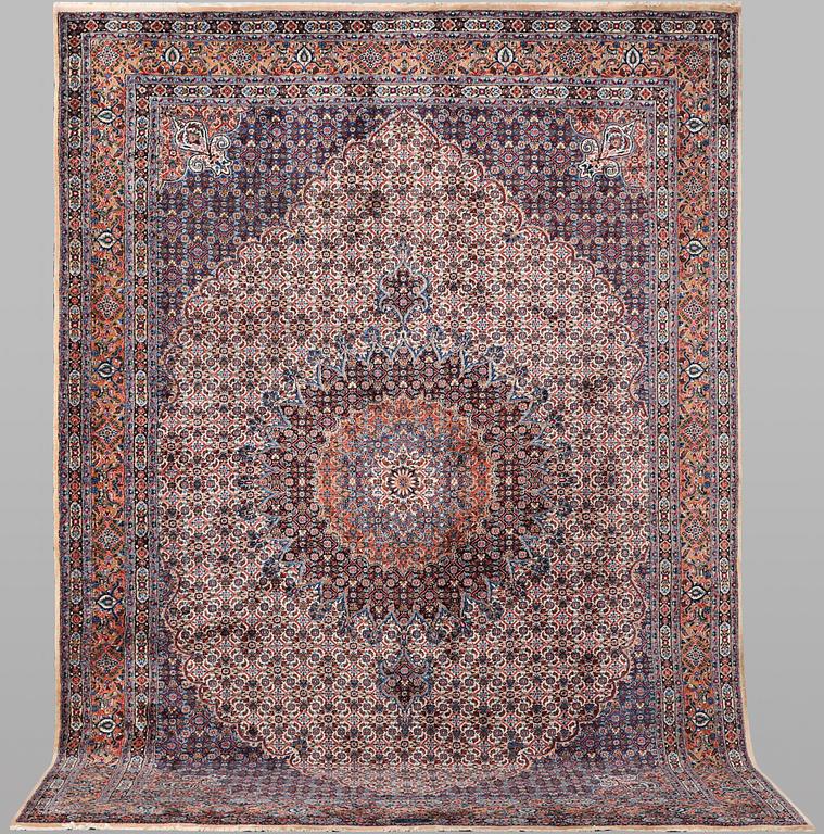 A carpet, Moud, signed, ca 385 x 268 cm.