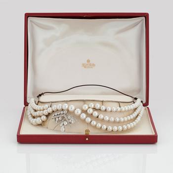 A TIARA with cultured pearls and a detachable brooch set with old-cut diamonds.
