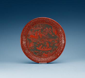 1332. A large red lacquer dish, Qing dynasty.