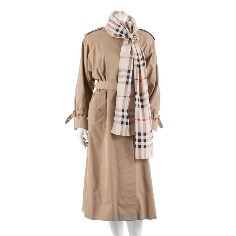 BURBERRY, a beige cotton blend trenchcoat and a shawl.