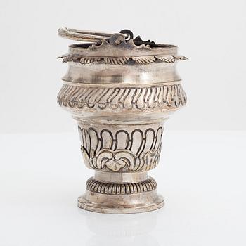 A silver plated brass Holy water bowl stamped L.G and dated 1774.