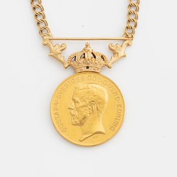 Medal, for diligence and integrity, gold, with a later chain in 18K gold.