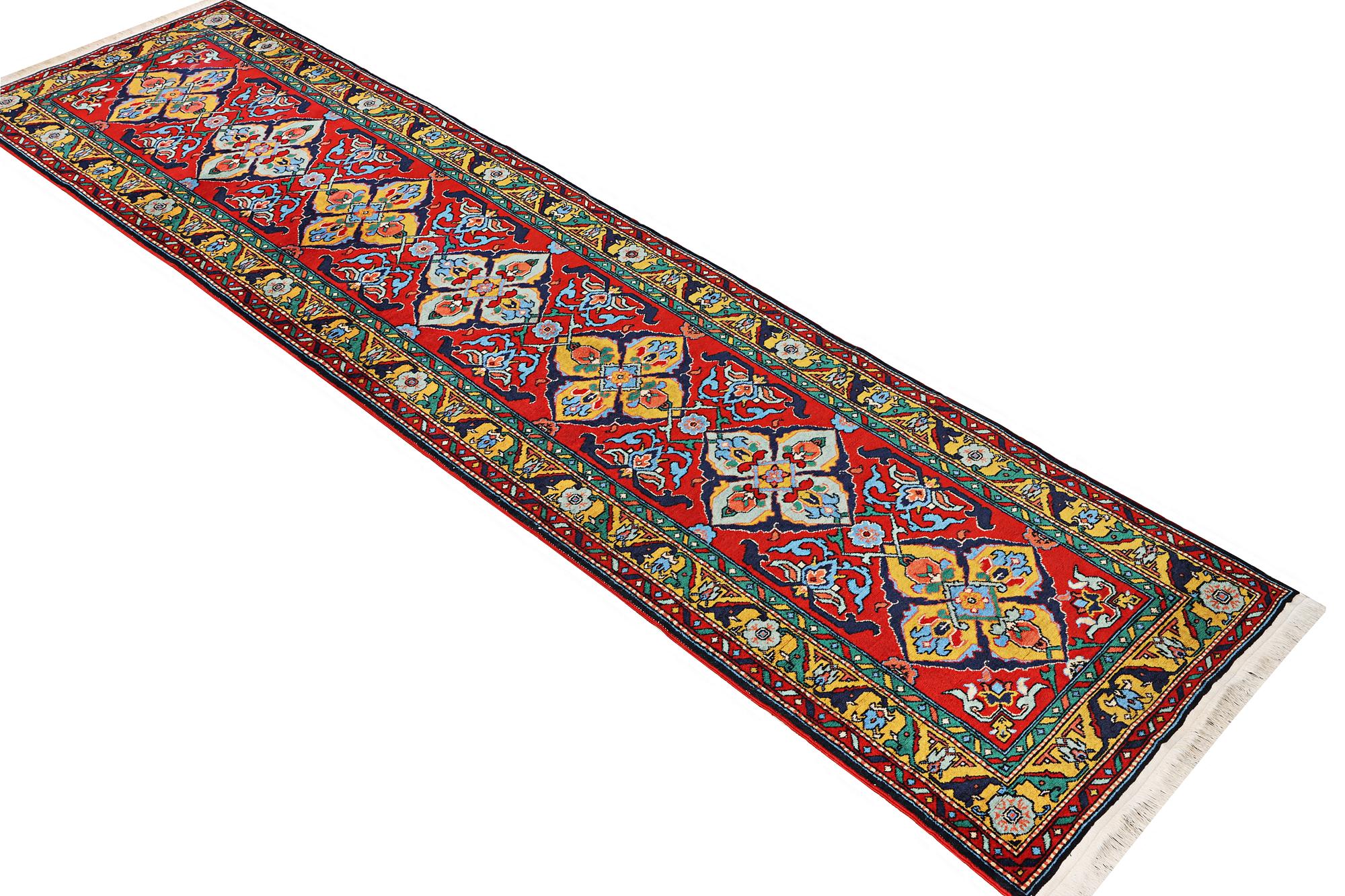 A Kazak runner carpet, c. 344 x 83 cm.