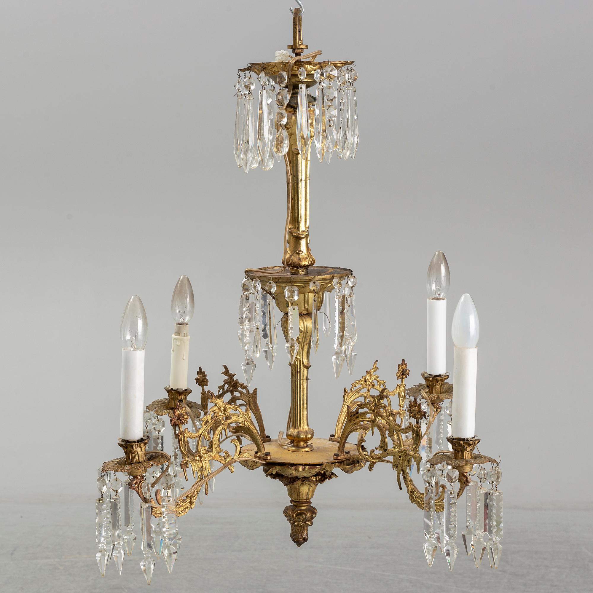 A late 19th century brass ceiling light.