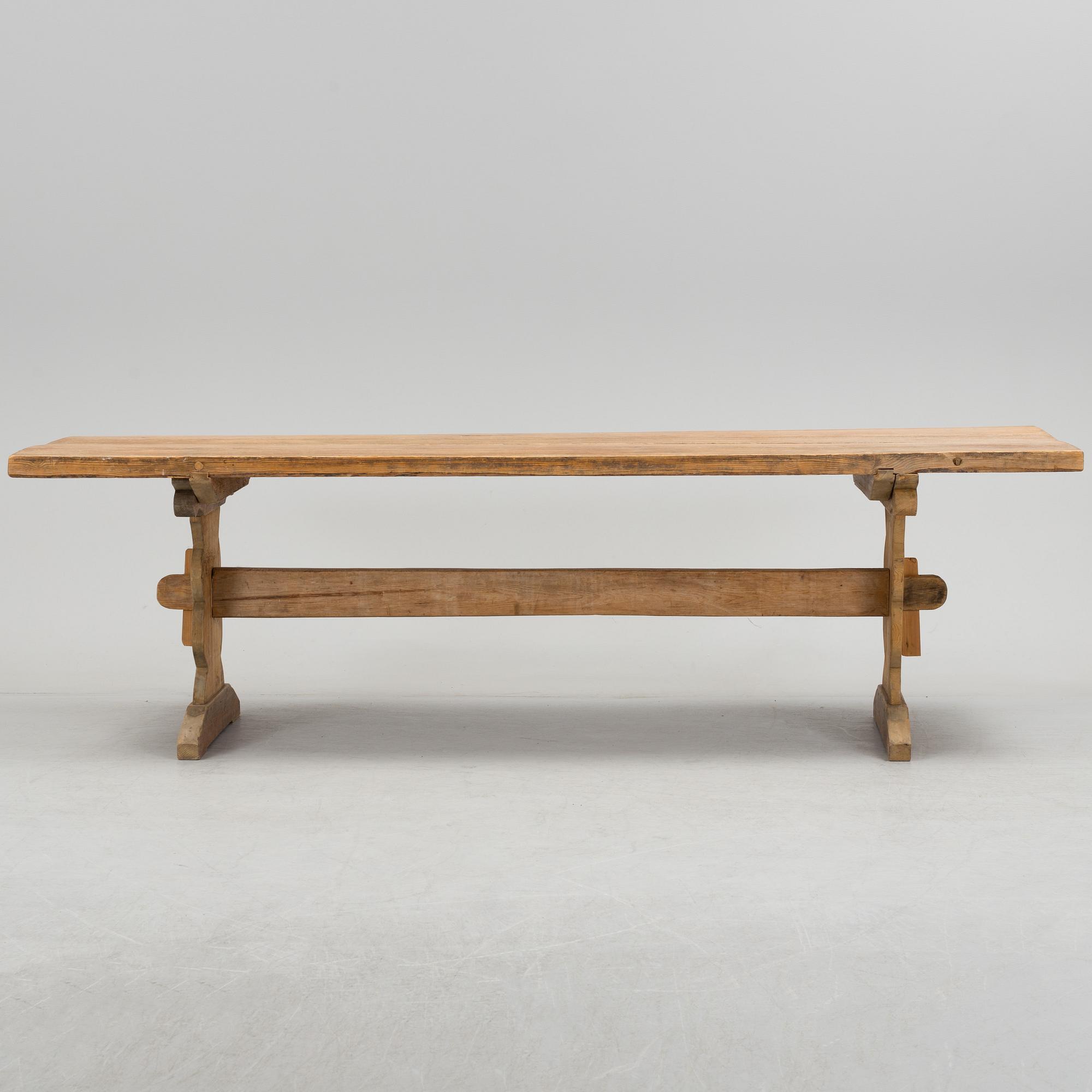 A 20th century pine table.