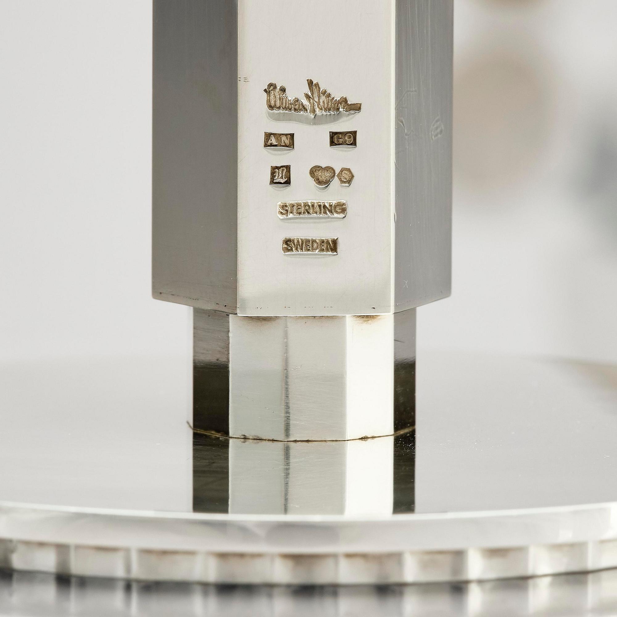 Wiwen Nilsson, a pair of sterling silver candlesticks, Lund, Sweden 11957 and 1960.