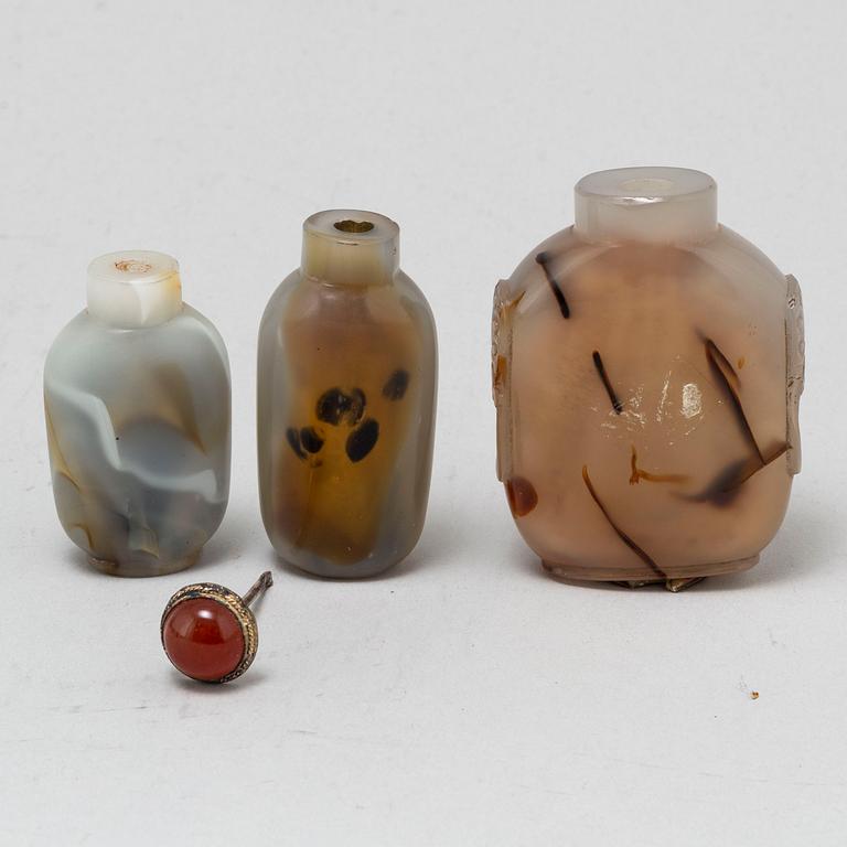 Nine Chinese glass and stone snuff bottles, 20th century.