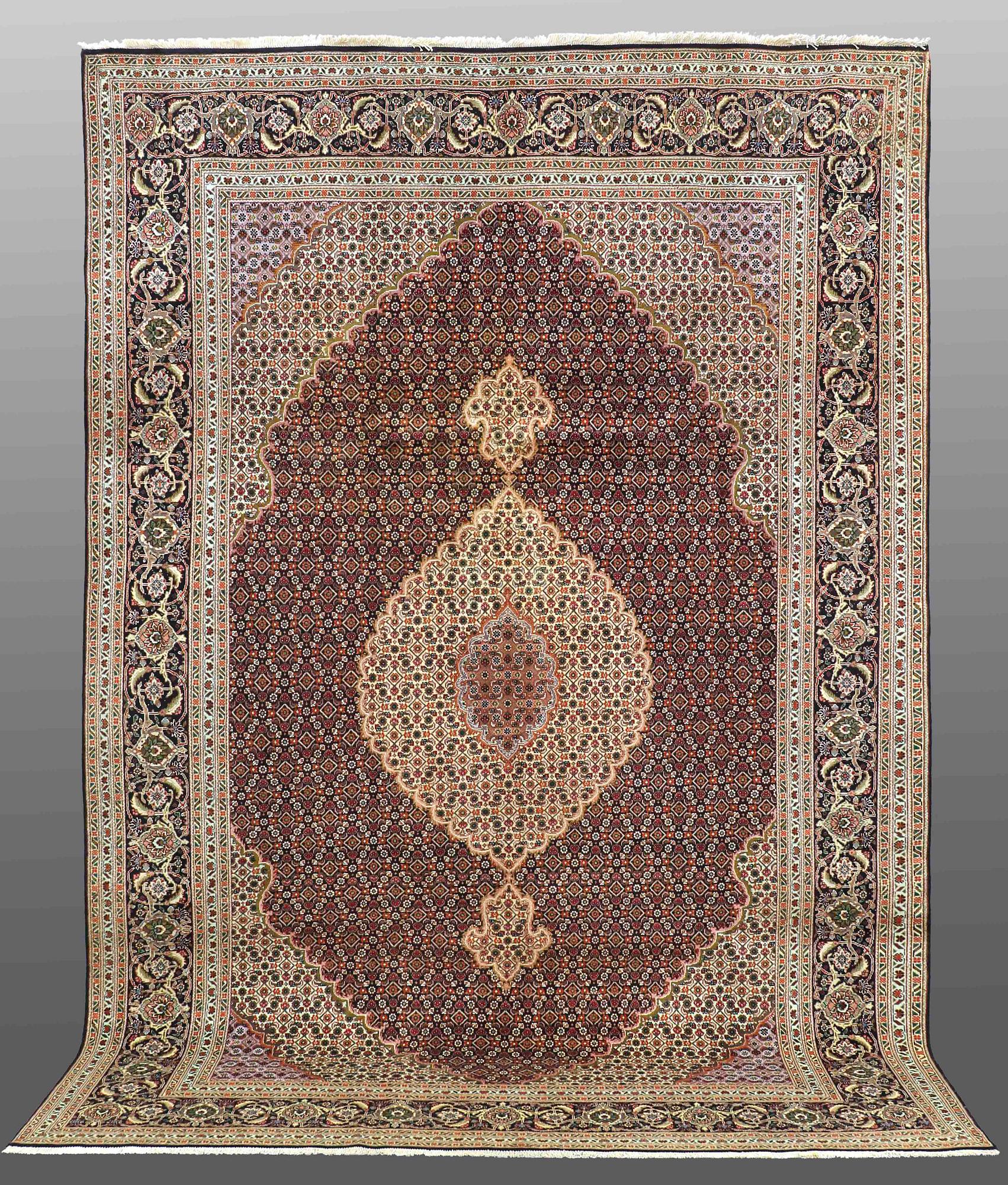 A CARPET, Tabriz part silk , so called 40 Radj, ca 298 x 202 cm.