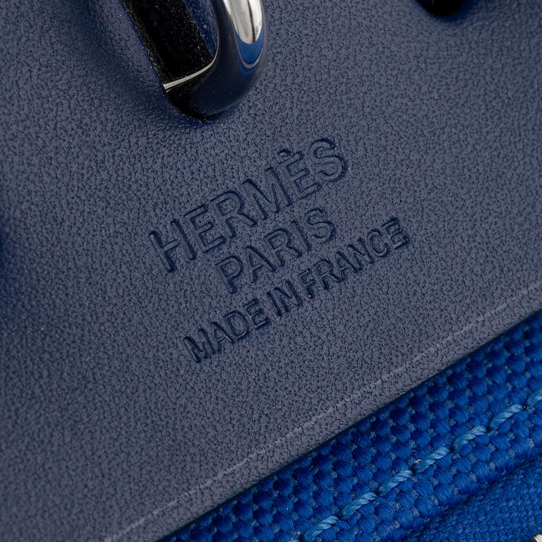 Hermès, a 'Herbag Zip 31' handbag in Bleu Saphir Hunter leather and Bleu Billard military canvas, 2021.