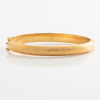 Bangle, 18K gold, Boliden gold, stylized leaf decoration.