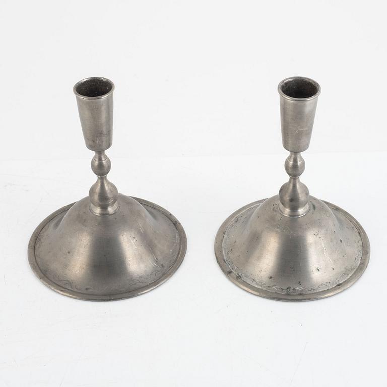 Firma Svenskt Tenn, a pair of pewter candlesticks model "76", Stockholm 1930.