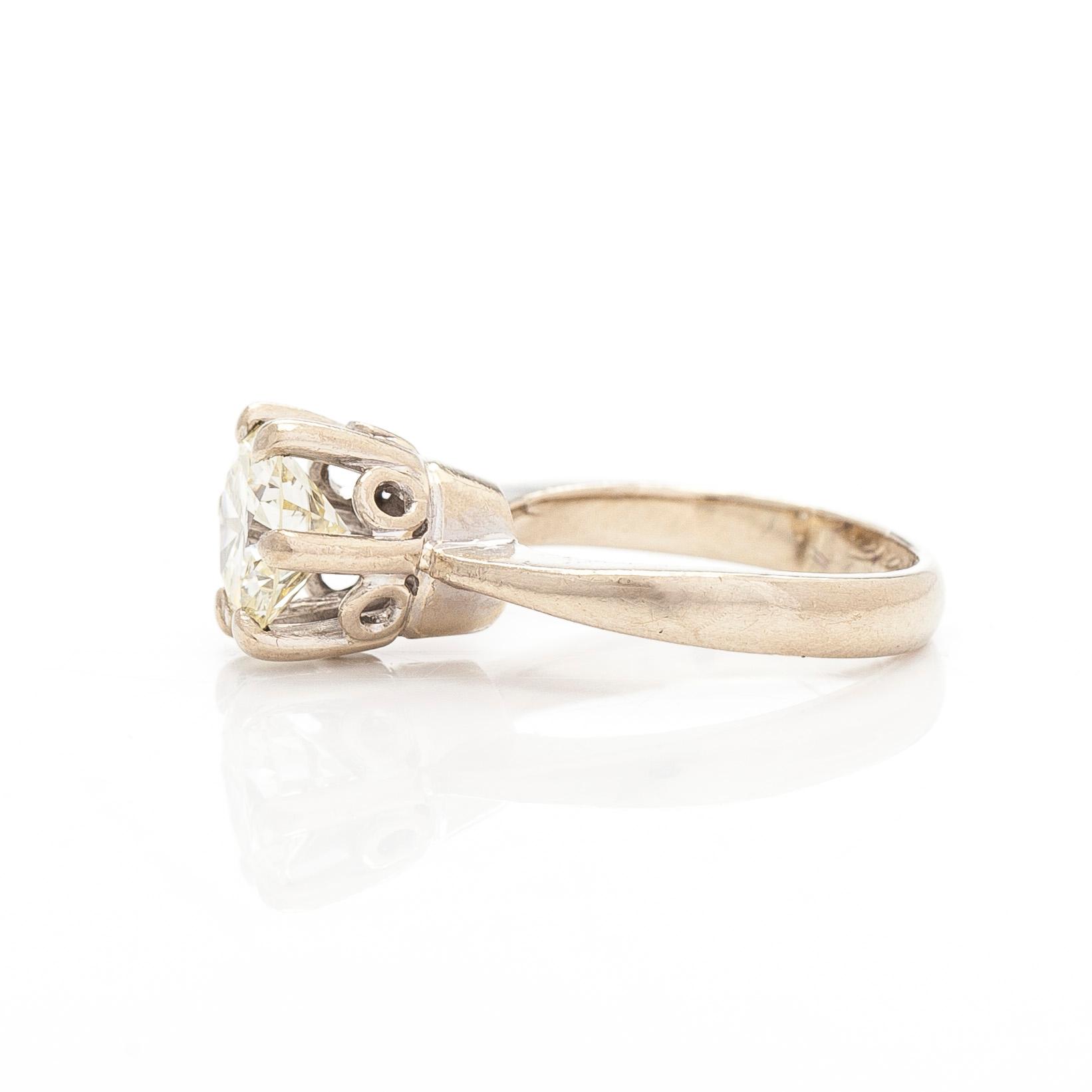 An 18K white gold ring, with a brilliant-cut diamond approximately 1.75 ct. With certificate.