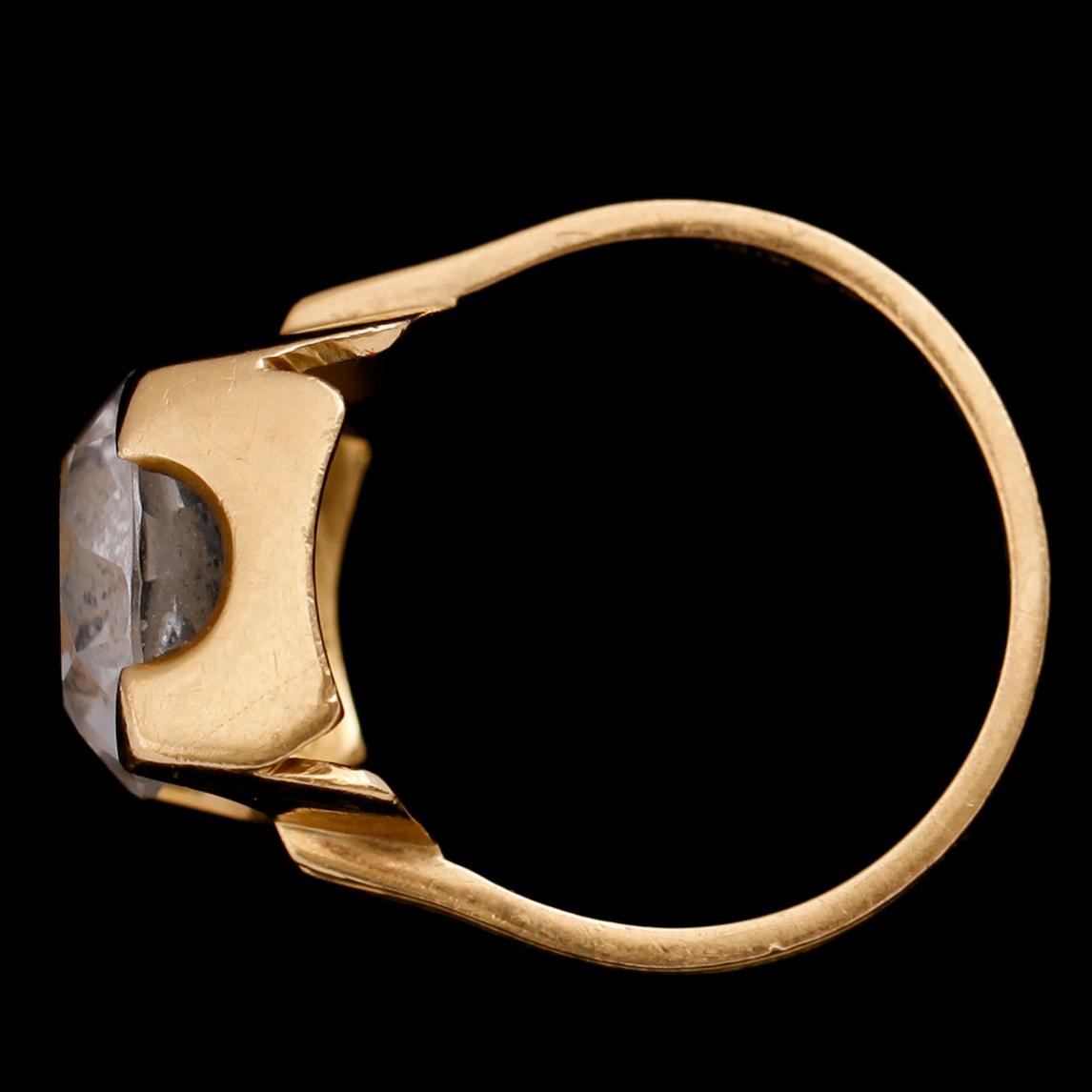 KEDJA SAMT RING, 18 k guld, 1900-talets andra hälft. Total vikt med bergkristall ca 18 gram.