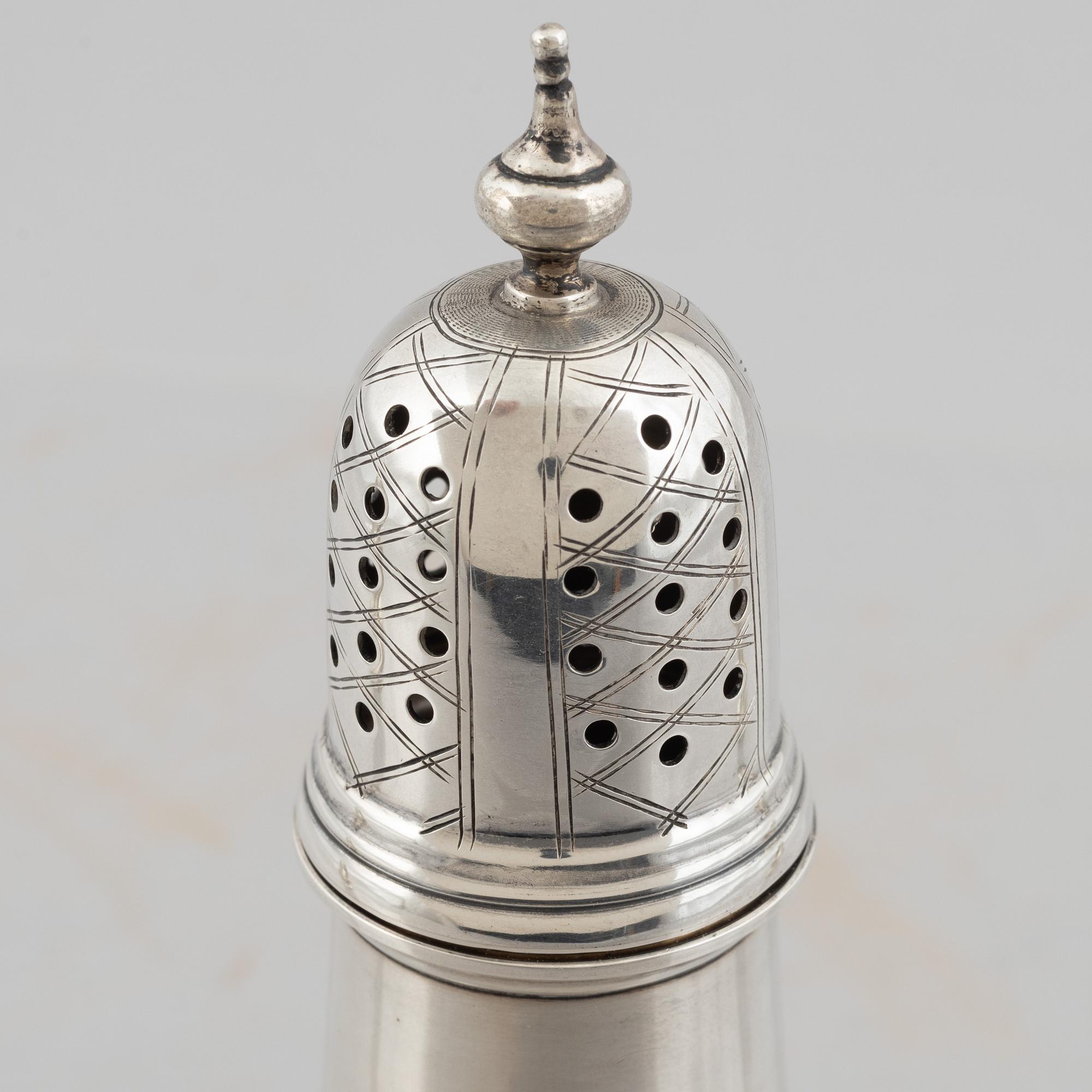 Three sterling silver shakers, 20th Century.