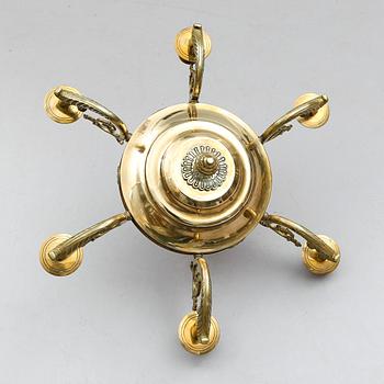 TAKAMPEL, mässing, empirestil, 1900-talets första hälft. Höjd ca 27 cm.