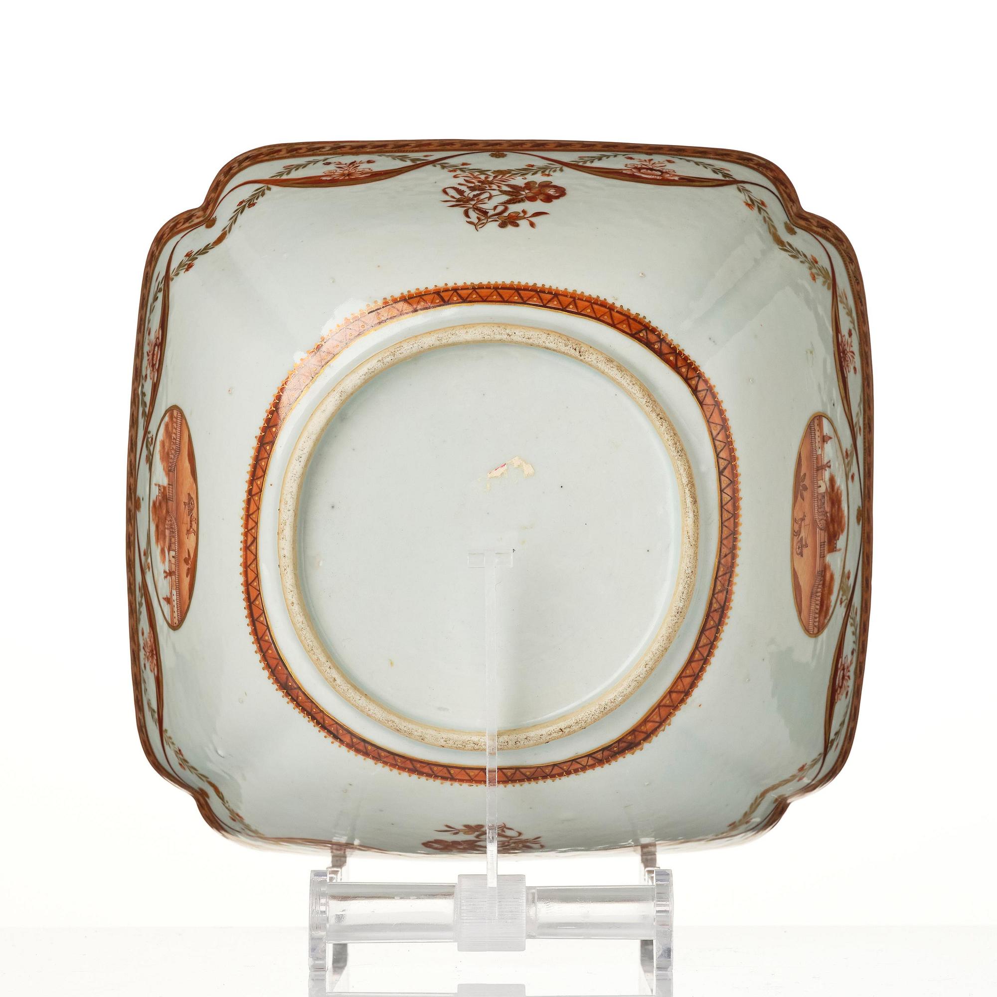 An oval vegetable tureen with cover and a pillow shaped bowl, Qing dynasty, late 18th century.