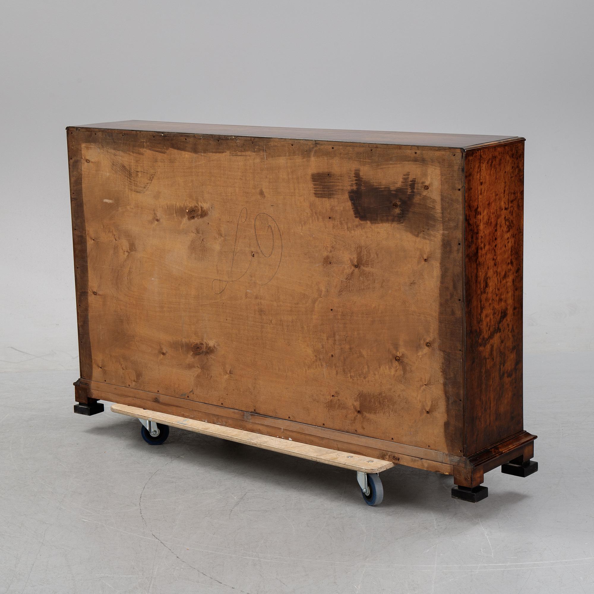 A birch display cabinet, Swedish Grace, first half of the 20th century.