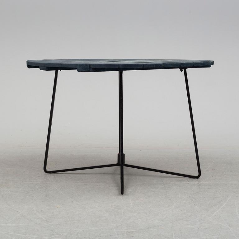 A mid 20th Century garden table from Grythyttan.