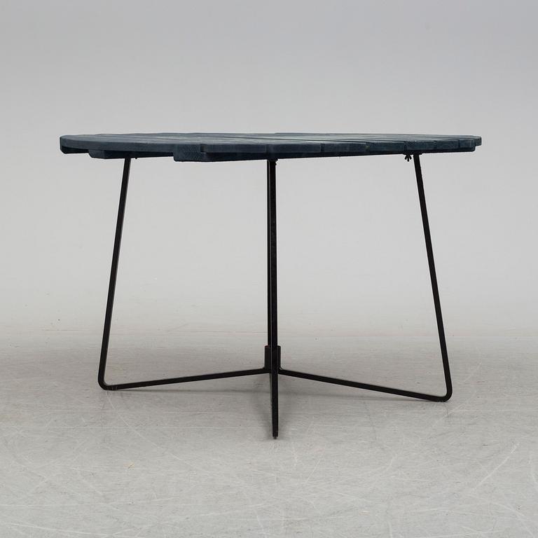 A mid 20th Century garden table from Grythyttan.