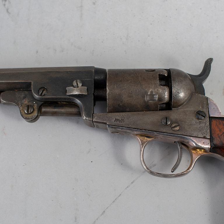 A Colt 1849 pocket percussion revolver with serial no 92569.