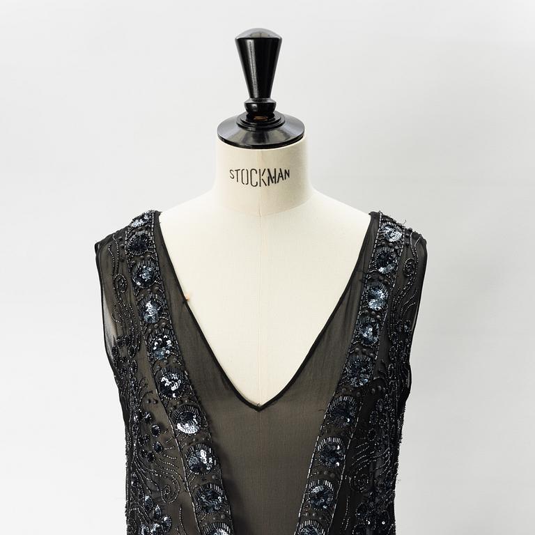 A pearl and sequin embroidered 1920's dress.