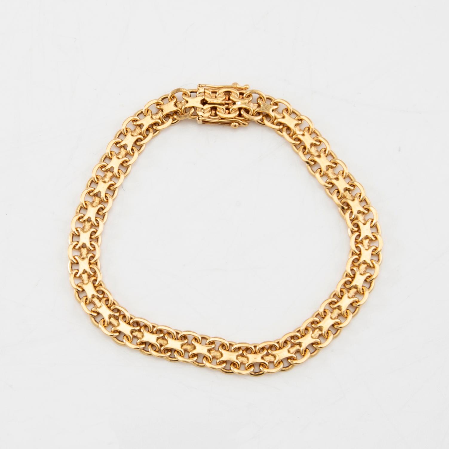 Bracelet X-link 18K gold.