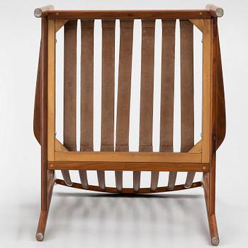 Folke Ohlsson, a pair of 'USA 75' armchairs, Dux, Sweden, 1960's.