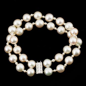 PEARL BRACELET, 2 strands of Akoya pearls with small pearls in between.