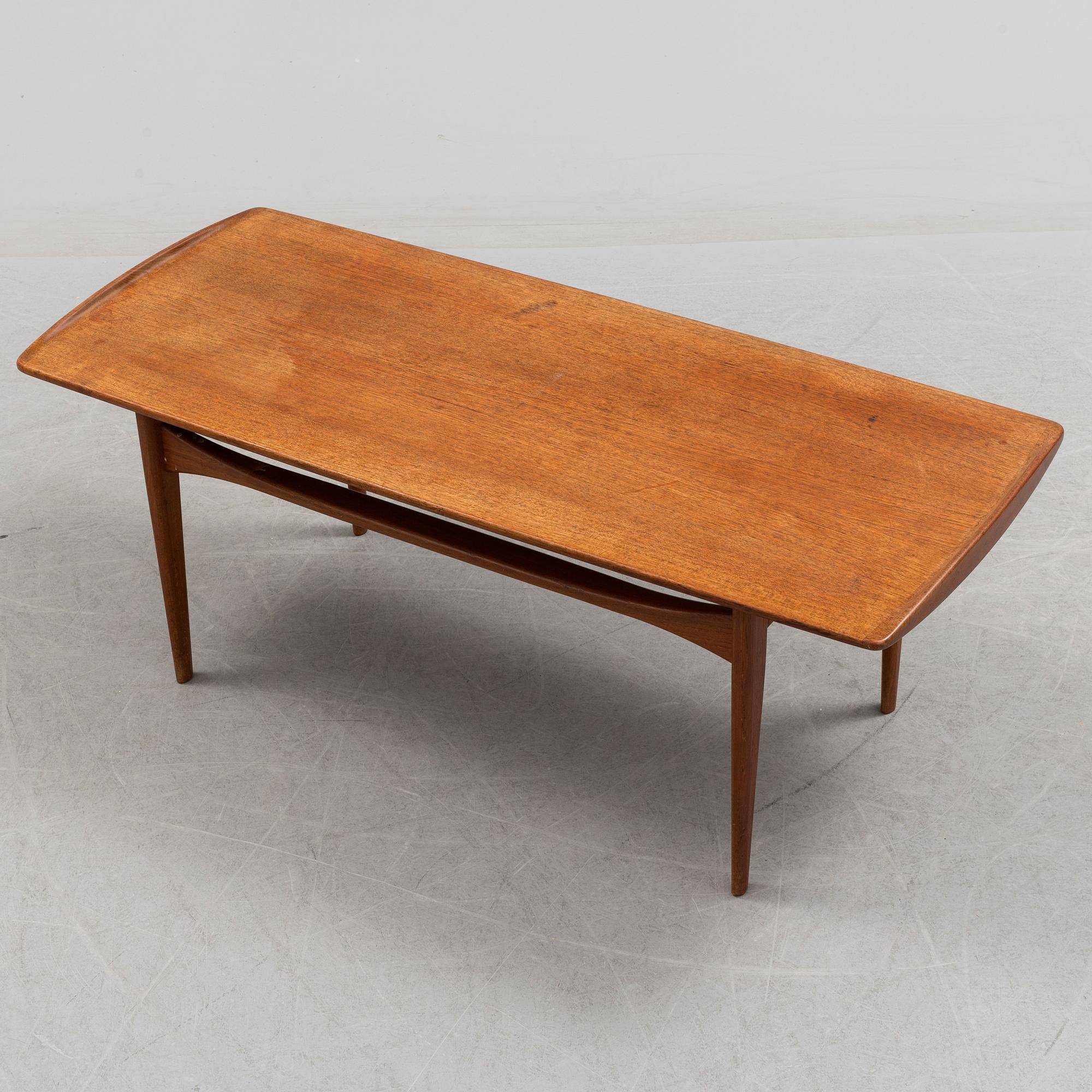 A 1950-/60´s table by Edward Kindt-Larsen France & Søn, Denmark.