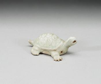 A pale celadon glazed figurine of a turtle, Song dynasty (960-1279).