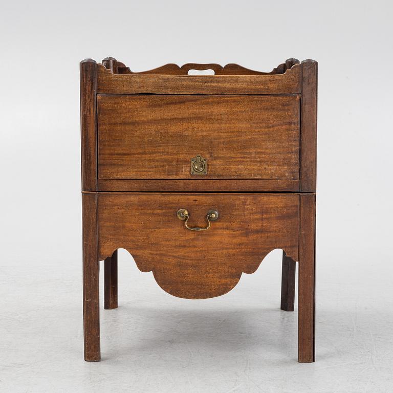 A mahogany bedside table, England, around 1900.