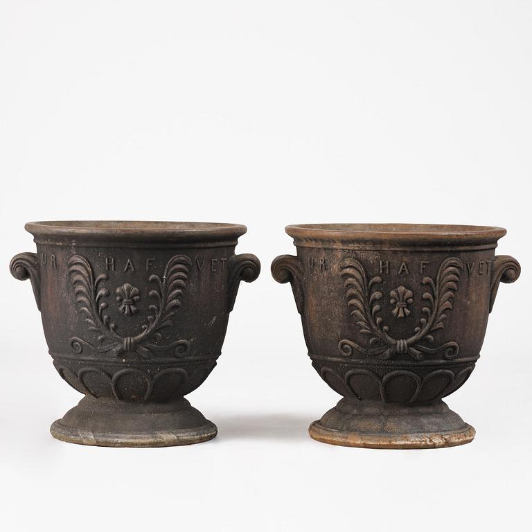 Ivar Johnsson, a pair of "Venus" cast iron urns, Näfveqvarns bruk, Swedish Grace.