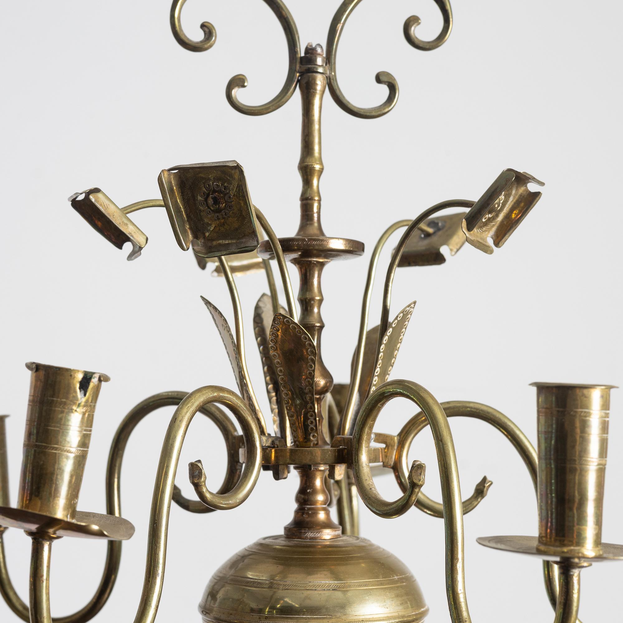 A Swedish five-branch brass chandelier, circa 1800.