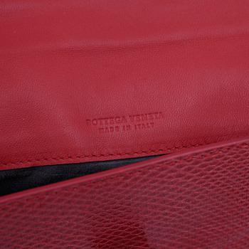 BOTTEGA VENETA, a leather clutch/wallet in the colour "Fever".